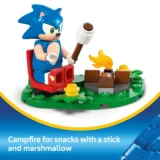 Lego Sonic Minifigure Roasting a Marshmallow over a Campfire on a Green Baseplate