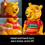 Instructional Collage of a Yellow Lego Pig Figure Turning Its Head Moving Ears Lifting Arms Caption Reads 'head and Hand Turn Ears Move Arms Lift'