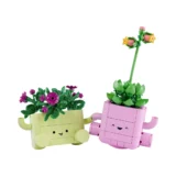 Two Cute Plant themed Lego Blocks with Smiling Faces One Pale Yellow Pot with Purple Flowers and the Other Pink Pot with Green Leaves and a Tall Flowering Stem