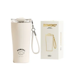 Cream colored Insulated Tumbler with a White Wrist Strap Shown Beside Its Zowoki Box