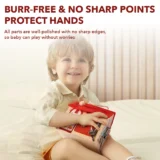 Smiling Toddler on a Bed Holding a Red Toy Box Banner Text Says 'burr free & No Sharp Points Protect Hands'