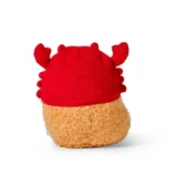 Red Plush Crab looking Pillow with Beige Bottom Seen from Behind a Soft Cuddly Stuffed Toy