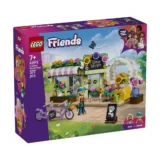 Lego Friends Flower Shop Playset Box Featuring a Colorful Storefront Archway and Minifigures in a Garden Scene