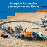 Banner Showing a Lego Train Set with a Snowplow Locomotive Passenger Car and Flatcar on a Curved Track Across a Woven Rug Background