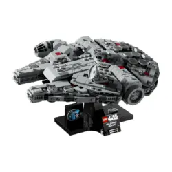 Lego Star Wars Millennium Falcon Model on a Black Display Stand with a Small Commemorative Plaque and Stickers Nearby