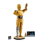 Life sized Lego Model of C 3po from Star Wars Standing on a Beige Base with One Arm Raised in Greeting