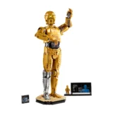 Life sized Lego Model of C 3po from Star Wars Standing on a Beige Base with One Arm Raised in Greeting