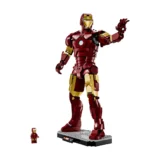 Lego Hulkbuster Armor from Iron Man with a Tiny Lego Iron Man Figure Beside It for Scale Posed with One Arm Raised