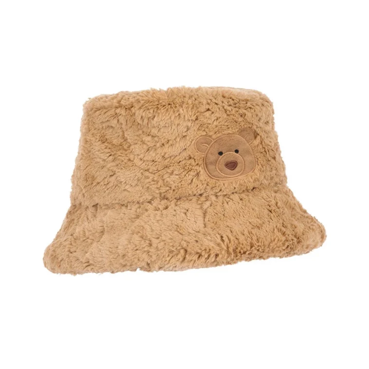 Fluffy tan bucket hat with a stitched bear face patch on the front.